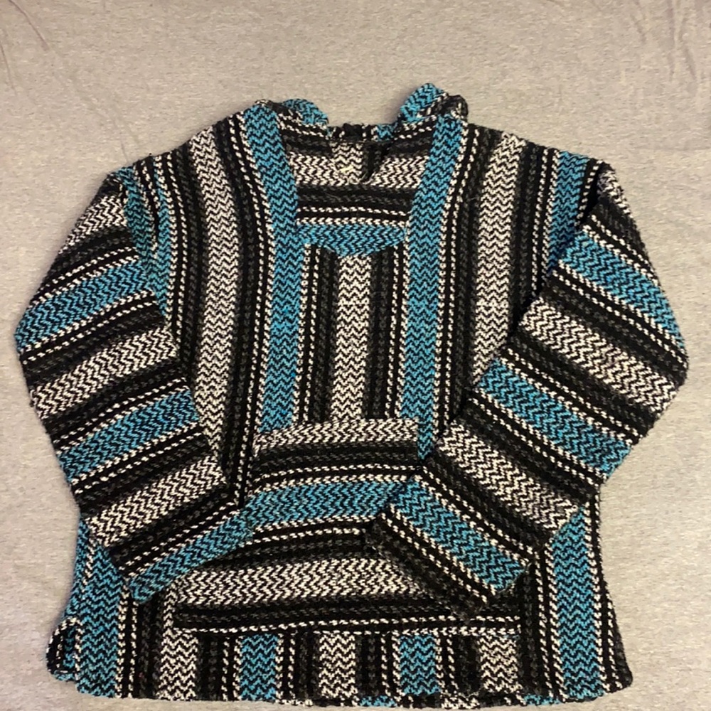 black, blue, and white drug rug